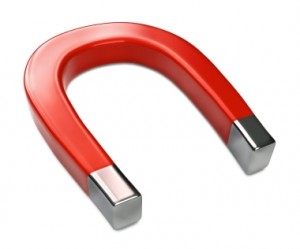 A horseshoe magnet over a white background